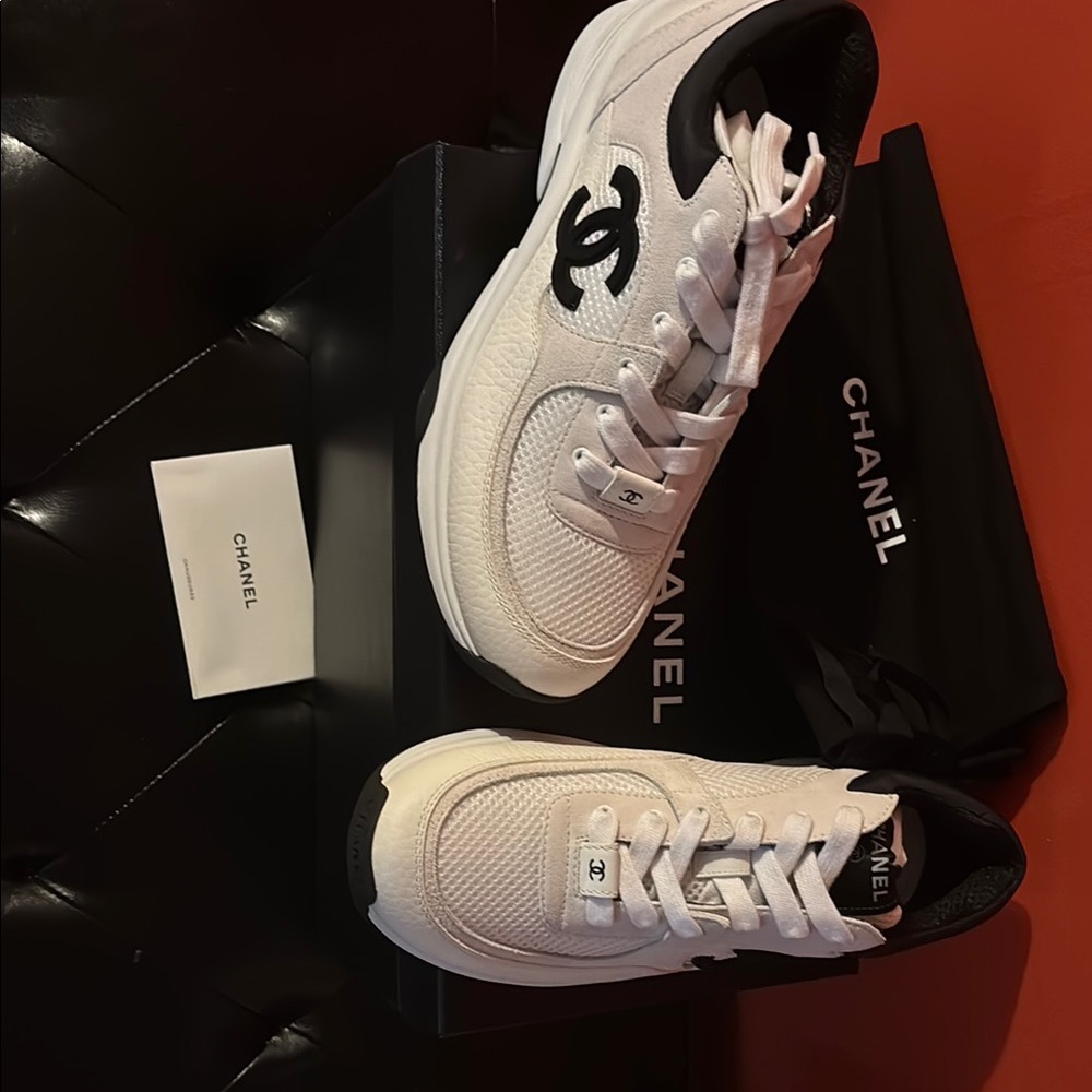 CHANEL White and Black Logo Sneakers